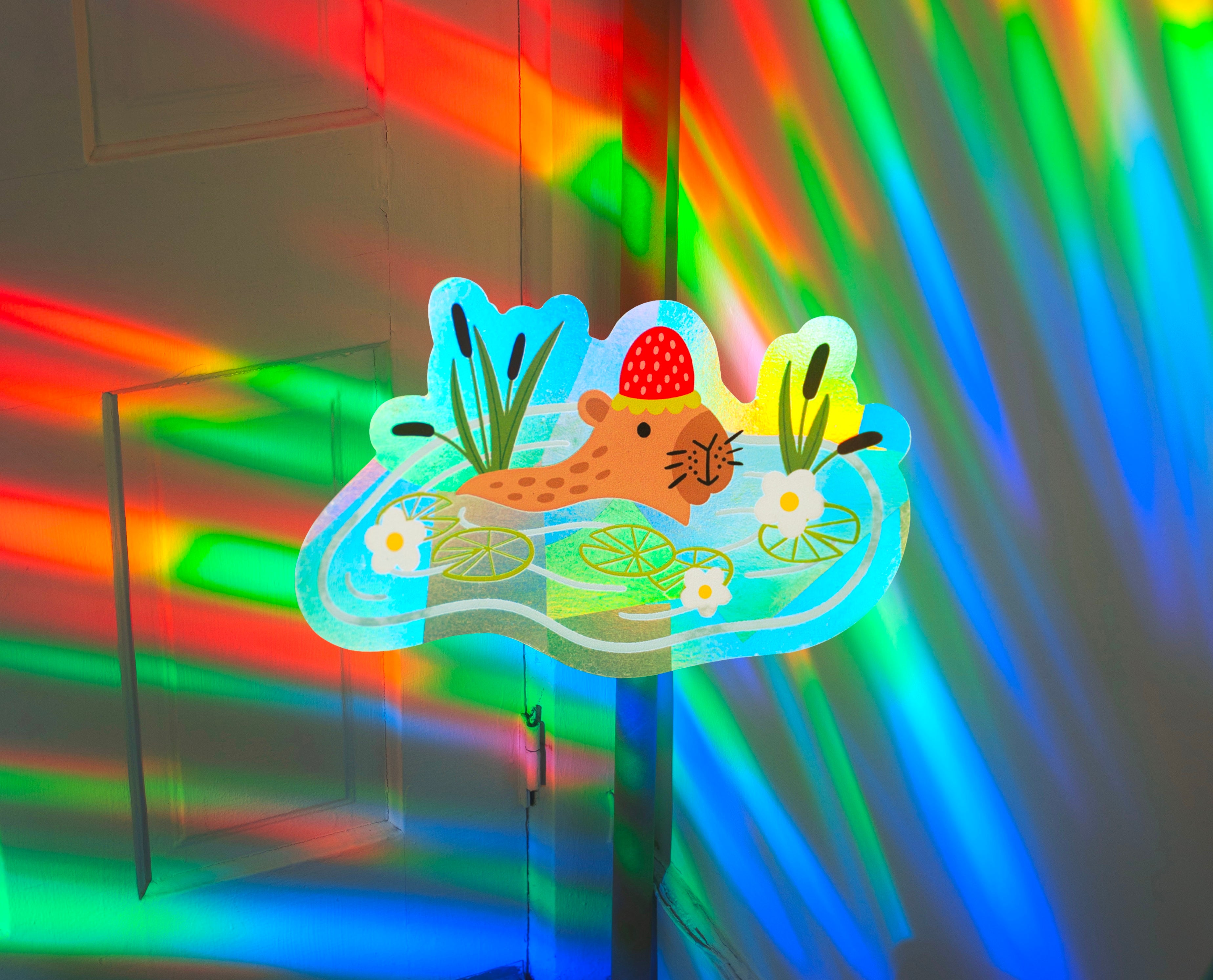 Strawberry Capybara Suncatcher Sticker – Prismatic Window Cling | Rainbow Maker Decal